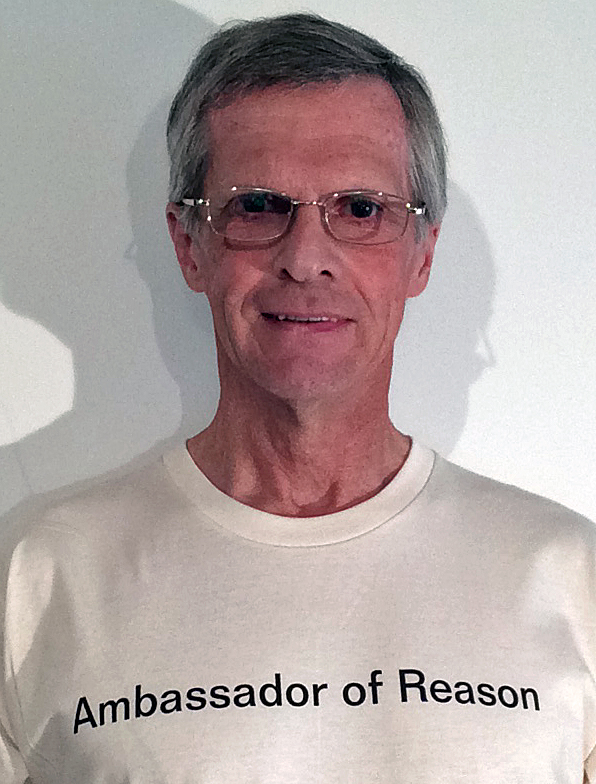 wearing a t-shirt that says Ambassador of Reason
